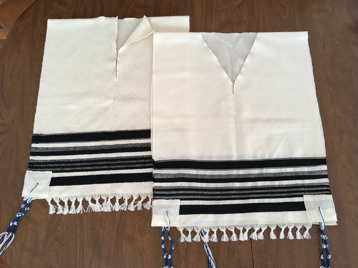 Two hand-woven tallit katan, one with T-shaped and one with V-shaped neck opening